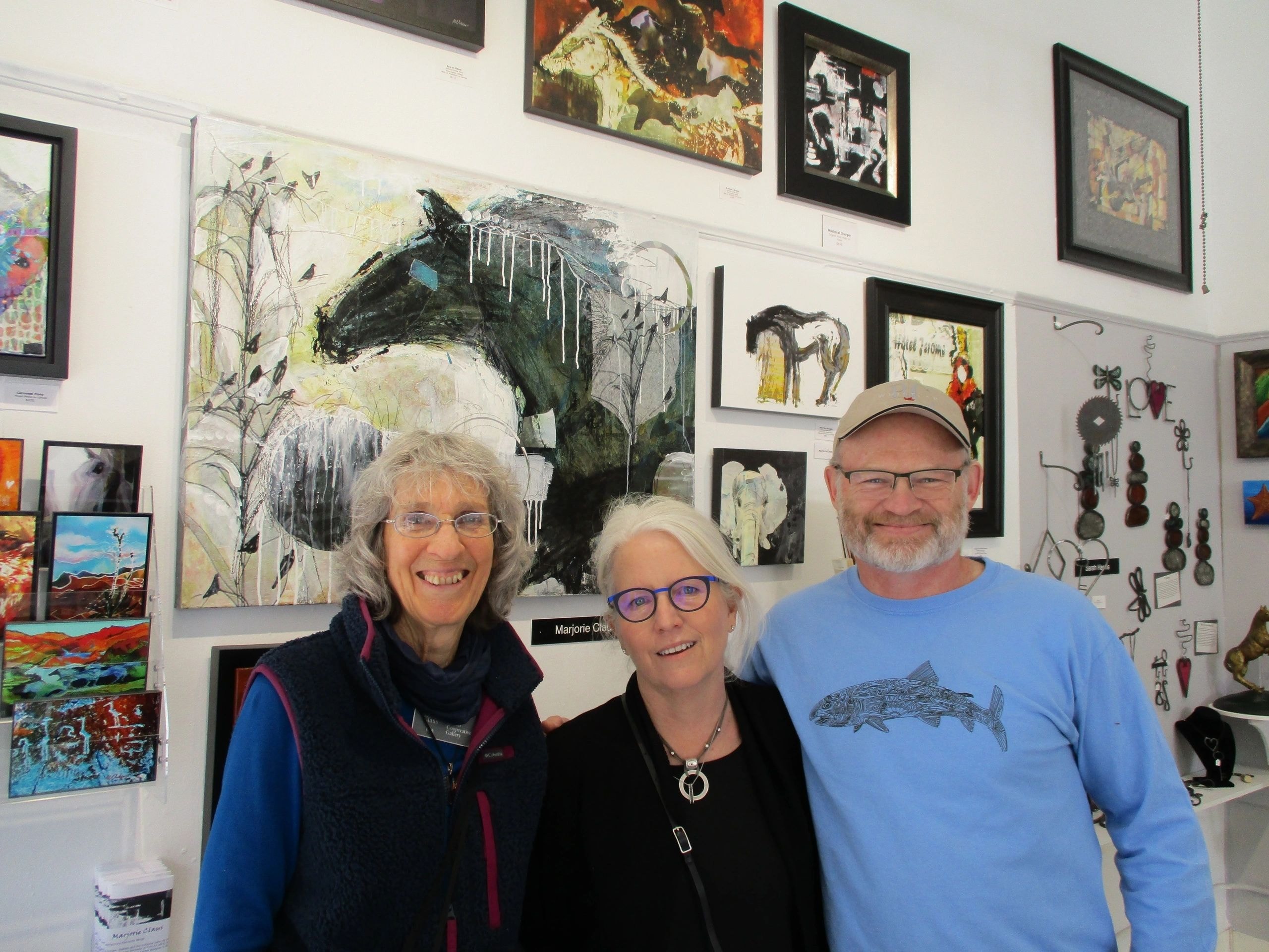 Summer Blue Herd — artwork by Marjorie Claus shown in a room setting